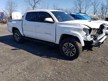 2023 toyota tacoma TRD in White- Front Three-Quarter View - BidGoDrive Inventory