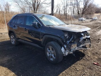 2024 toyota rav4 HYBRID LE in Black - Front Three-Quarter View - BidGoDrive Inventory