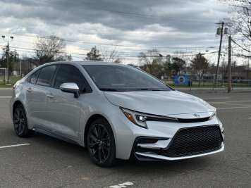 2024 toyota corolla LE in Silver - Front Three-Quarter View - BidGoDrive Inventory