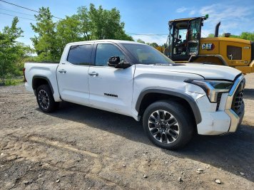 2023 toyota tundra LIMITED HV in White - Front Three-Quarter View - BidGoDrive Inventory
