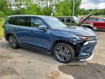2026 toyota grand-highlander HYBRID MAX PLATINUM in Blue - Front Three-Quarter View - BidGoDrive Inventory