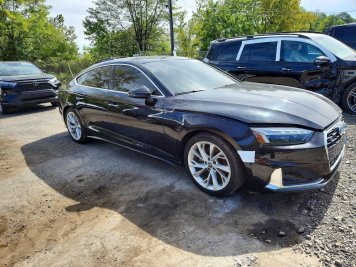 2024 audi a5  in Black - Front Three-Quarter View - BidGoDrive Inventory