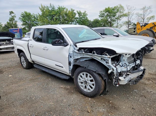 2025 Toyota Tacoma  in White - Front Three-Quarter View - BidGoDrive Inventory