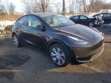 2024 tesla model-y  in Black - Front Three-Quarter View - BidGoDrive Inventory