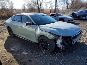 2025 kia k4 GT-LINE TURBO in Green - Front Three-Quarter View - BidGoDrive Inventory