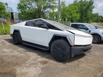 2024 tesla cybertruck  in White - Front Three-Quarter View - BidGoDrive Inventory