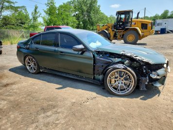 2022 bmw m5 CS in Green - Front Three-Quarter View - BidGoDrive Inventory