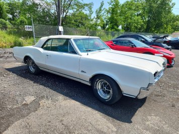 1967 oldsmobile cutlass  in White - Front Three-Quarter View - BidGoDrive Inventory