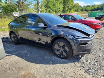 2026 tesla model-y  in Black - Front Three-Quarter View - BidGoDrive Inventory