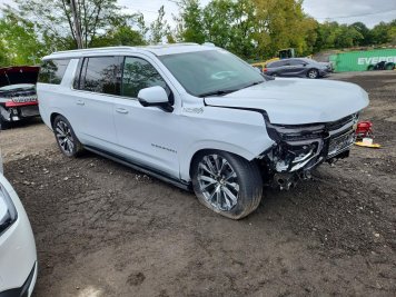 2026 chevrolet suburban HIGH COUNTRY in White - Front Three-Quarter View - BidGoDrive Inventory
