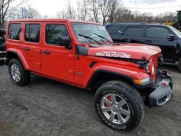 2020 jeep wrangler UNLIMITED SAHARA in Red- Front Three-Quarter View - BidGoDrive Inventory