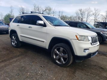 2012 jeep grand-cherokee OVERLAND in White - Front Three-Quarter View - BidGoDrive Inventory