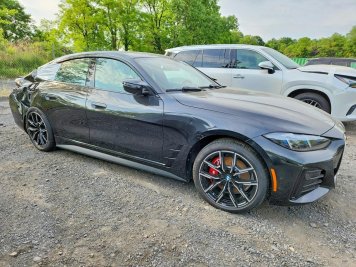 2025 bmw i4 M50 in Black - Front Three-Quarter View - BidGoDrive Inventory