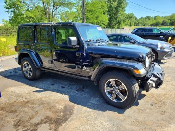 2023 jeep wrangler SAHARA in Black - Front Three-Quarter View - BidGoDrive Inventory