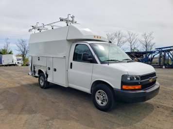 2024 chevrolet express  in White - Front Three-Quarter View - BidGoDrive Inventory