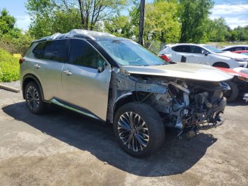 2025 nissan rogue PLATINUM in Gold - Front Three-Quarter View - BidGoDrive Inventory