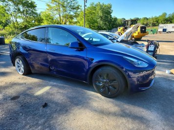 2023 tesla model-y  in Blue - Front Three-Quarter View - BidGoDrive Inventory