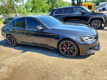 2023 bmw m5 COMPETITON in Black - Front Three-Quarter View - BidGoDrive Inventory