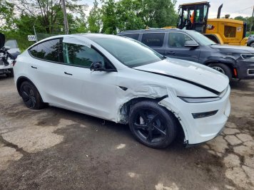 2026 tesla model-y  in White - Front Three-Quarter View - BidGoDrive Inventory