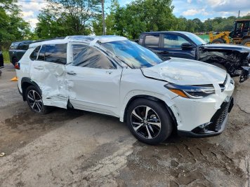 2024 toyota corolla CROSS HYBRID XSE in White - Front Three-Quarter View - BidGoDrive Inventory