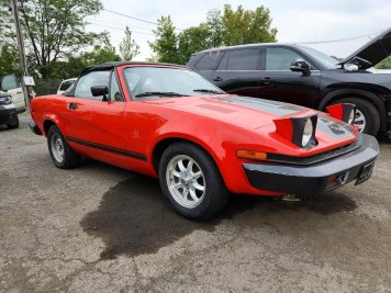 1980 triumph tr7 Roadster in Red - Front Three-Quarter View - BidGoDrive Inventory