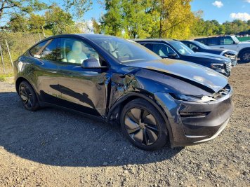2026 tesla model-y  in Gray - Front Three-Quarter View - BidGoDrive Inventory