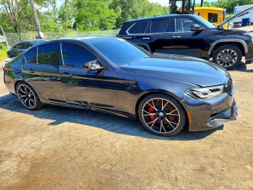 2023 bmw m5 COMPETITON in Black - Front Three-Quarter View - BidGoDrive Inventory